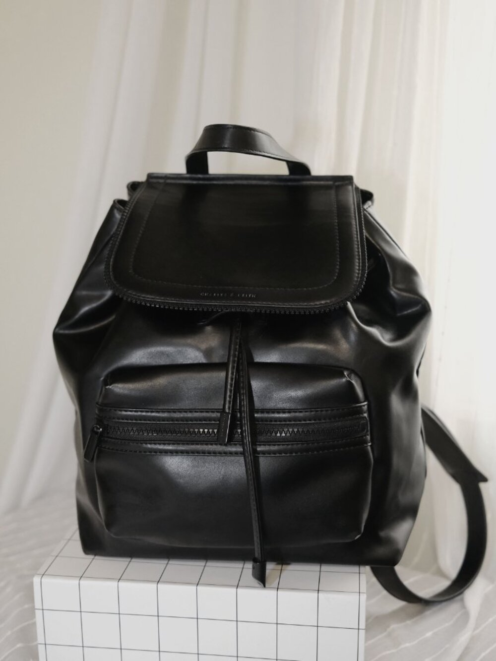 Charles & Keith black backpack